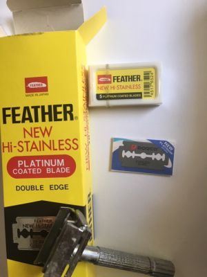 Unopened box of 100 Feather platinum-coated, double-edge razor blades.