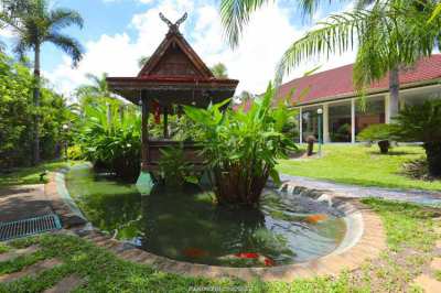 Spacious property in a secured village with pool and fish pond 