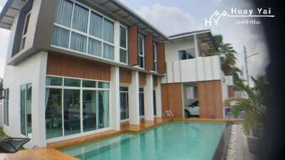 #3167   Former Show house with swimming pool. Abundance of built ins 