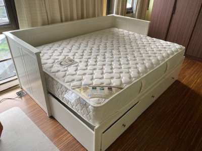 Queen size bed with spring mattress