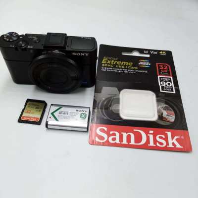 SONY RX100 II CAMERA (USED) WITH NEW SANDISK SDHC UHS-I CARD 32 GB