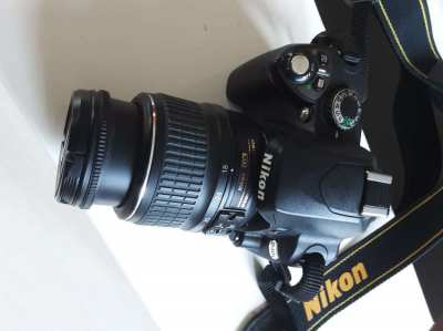 Nikon D40x DSLR camera with 2 Nikon zoom lenses