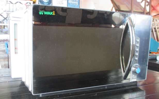 WAKI MW 9023 Multi Steam microwave, good condition, used normally.