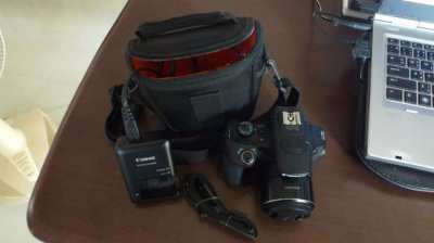 MINT Canon PowerShot SX60 HS 16.1MP 65x Optical Zoom with tripod.
