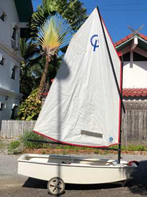 Optimist sailing boat with dolly, very good condition 70,000 thb