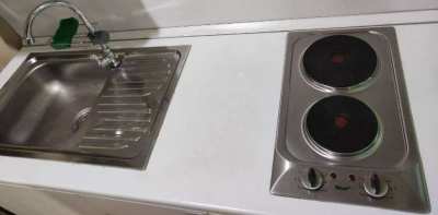 Selling cheap electric stove and sink with faucet and counter top