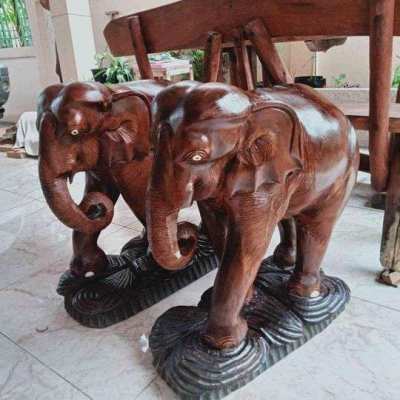 Two wooden elephants 