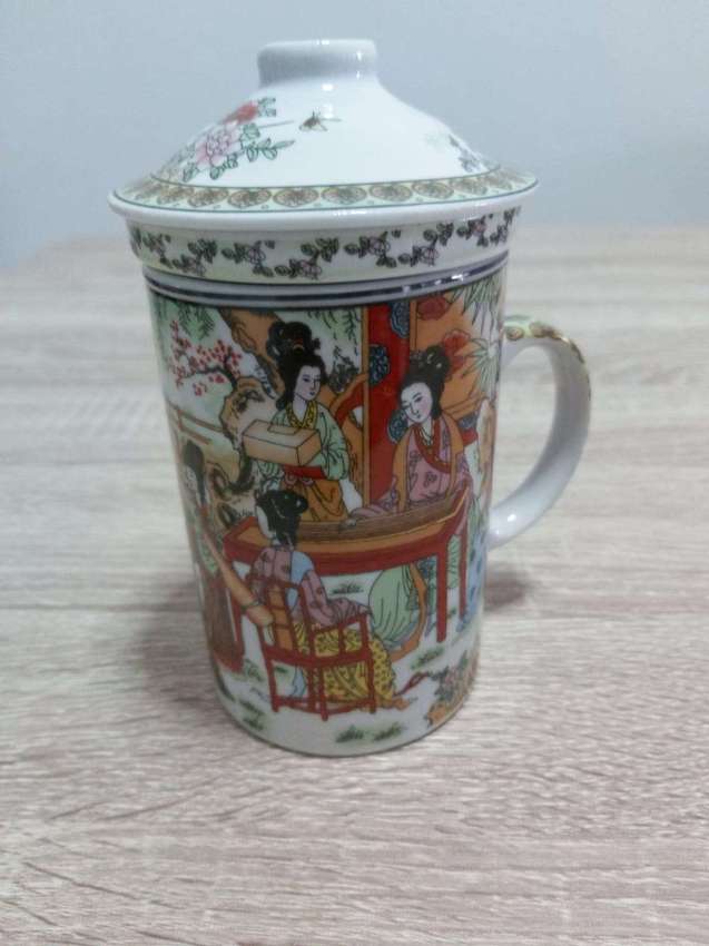REDUCED Large chinese teacup decorated with family  with  infusor