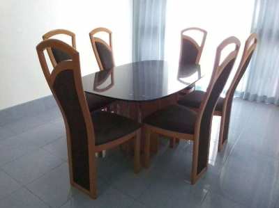I am selling a living room table with 6 chairs. Rolf Benz