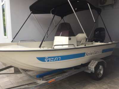 Swiss Cat 15 with 60 Hp fourstroke (20Hrs) + Up beat factory trailer