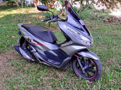 2018 Honda PCX 150, clean and well kept and VERY fuel efficieny.