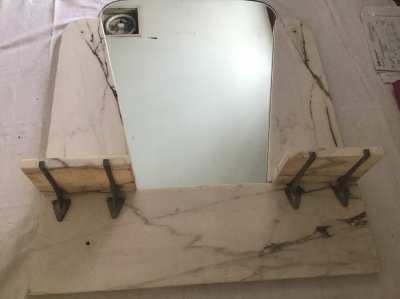 Year 1949 mirror in marble setting 