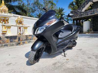 Boyfriends low milage barely used black Honda Forza 300 for sale