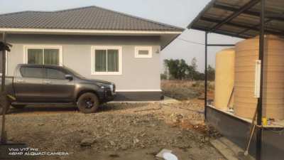 3 bedroom house, two bathrooms, one rai of land next to main 4004 road