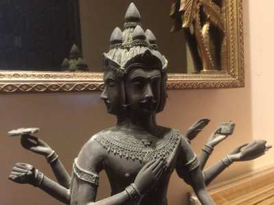 Hindu statues of God Brahma with four heads