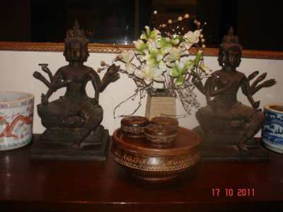 Hindu statues of God Brahma with four heads