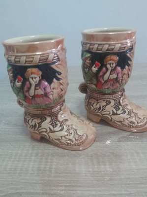 A pair of porcelain  shoes same design as german beer steims