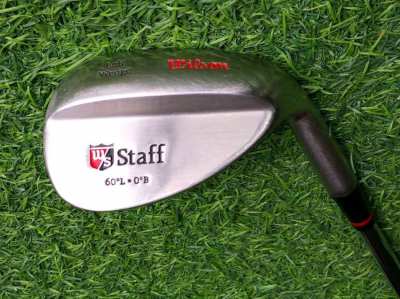 Wilson Staff 60° lob wedge with brass face.