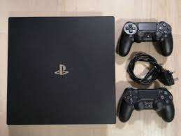 Playstation 4 Pro with 2 controllers