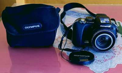 OM SYSTEM OLYMPUS SP-560UZ 8MP Digital Camera with Dual Image Stabiliz