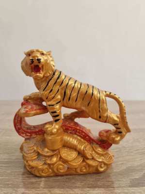 Lovely statue of a tiger on a stack of gold  coins 6
