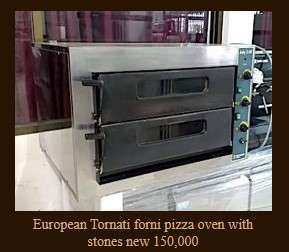 European Tornati forni pizza oven with stones